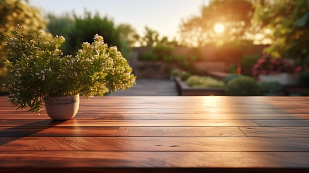 Peaceful garden scene with warm sunlit foliage and flowering plant on wooden table. Place for your product