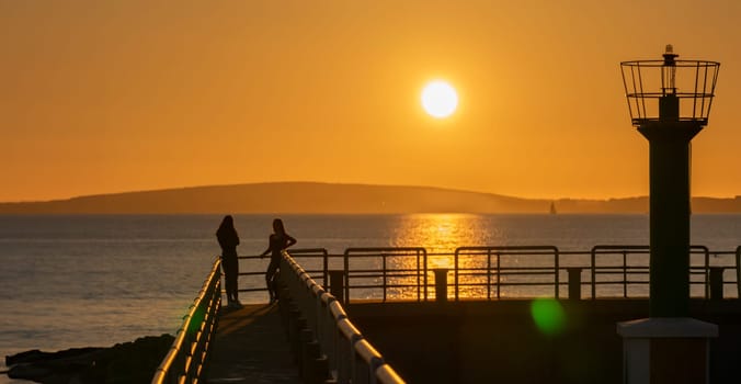 sunset at the port of portixol, in palma de mallorca