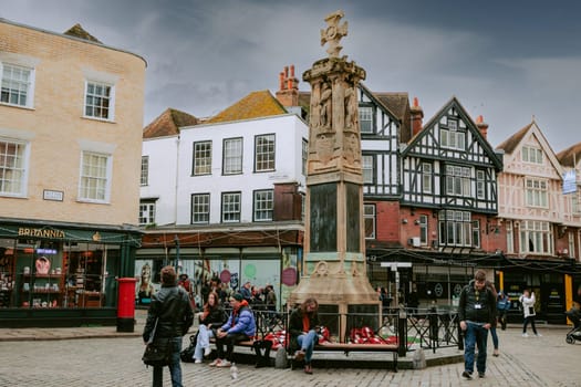 Snapshot of street life by the fountain in Canterbury's main square