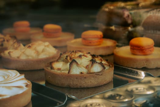 Close-up of desserts through a window