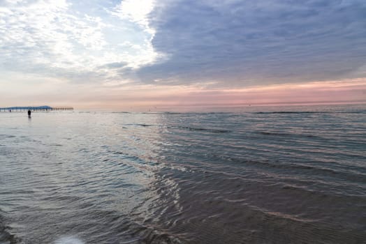 Beautiful sunset on the beach in Rimini.