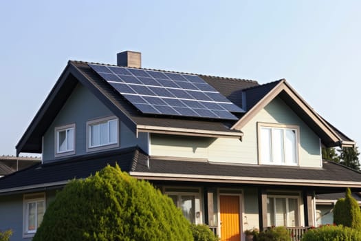 Photograph of a house with solar panel on the roof.