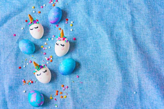 Easter eggs unicorns with painted closed eyes