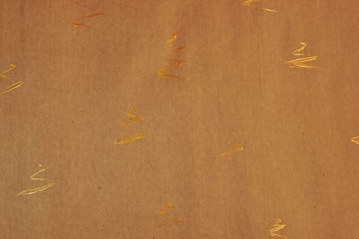 Gift wrapping paper texture.Painted paper, the concept of small Golden blots, in the shape of Christmas toys.
