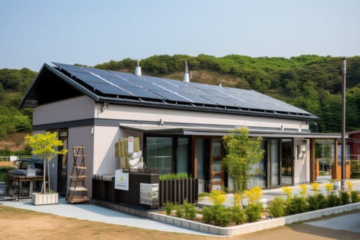 Photograph of a house with solar panel on the roof.