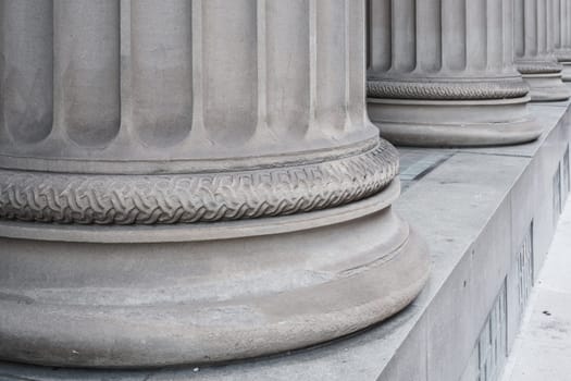 Architectural Detail of Greek Style Columns At A Courthouse, Bank Or Capital Building