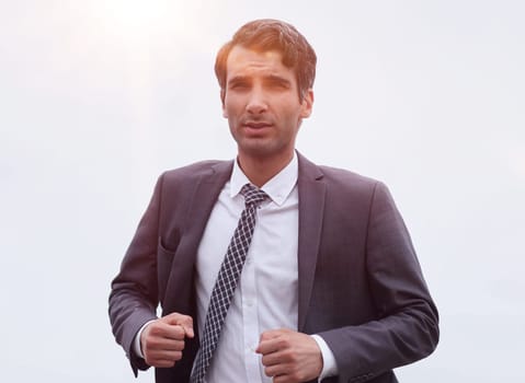 businessman running isolated on white. front view.