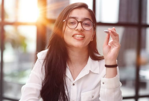 Portrait woman in office, happiness and online research for small business administration.