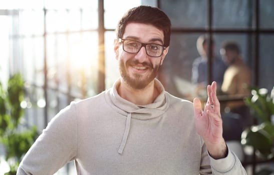 Portrait of a handsome businessman looking at camera