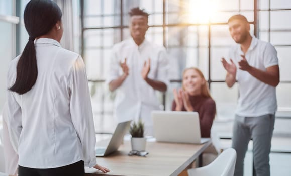 Businessmen and businesswomen talking during a meeting