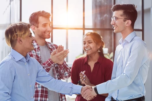 Businessman, partnership and shaking hands for human resources, hiring or greeting in workplace