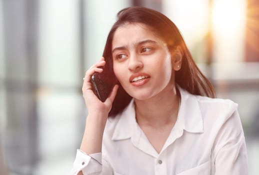 Informal Call. Young woman in glasses calling her friend, talking and asking about something, using laptop