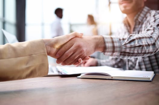 businessman shaking hands businessman in the office. success concept