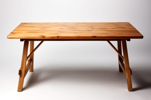 Table with legs made of natural wood on a white background.