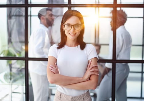 Portrait of a young business woman in an modern office