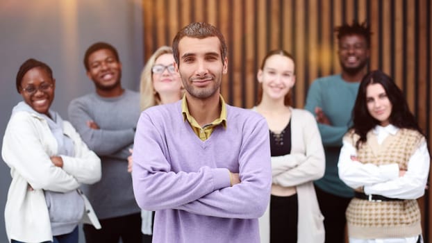 Group of business people standing at the window of a modern office