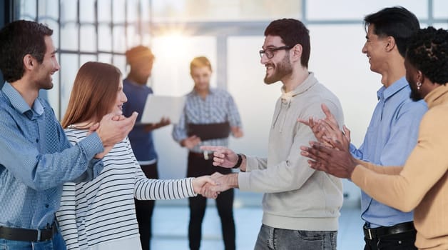 Business people stand and work in an office building