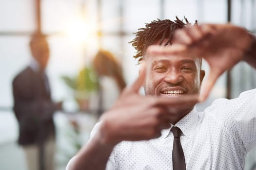 young african american man making a square with his hands