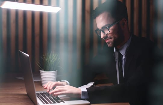 Portrait man, businessman, company founder, office worker sitting in the office