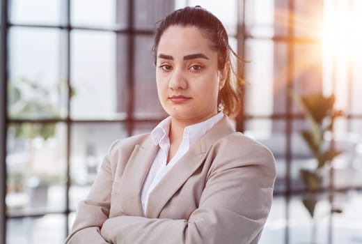 Portrait of girl leader or manager at a team planning, collaboration and strategy business meeting.