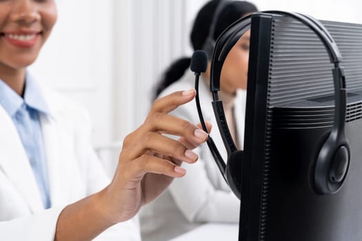 Close up shot of business people hand typing and working on desktop computer on the office desk. Business crucial communication and workplace concept.