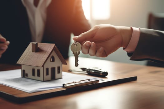 Real Estate Agent Giving Couple Key to a New House.