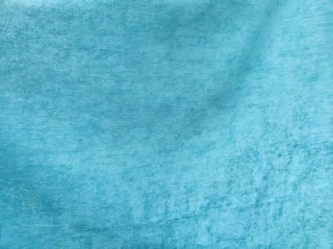 Abstract Background texture of light blue fabric close-up. Pattern, place for text and copy space