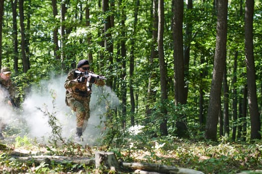 A specialized military antiterrorist unit conducts a covert operation in dense, hazardous woodland, demonstrating precision, discipline, and strategic readiness.