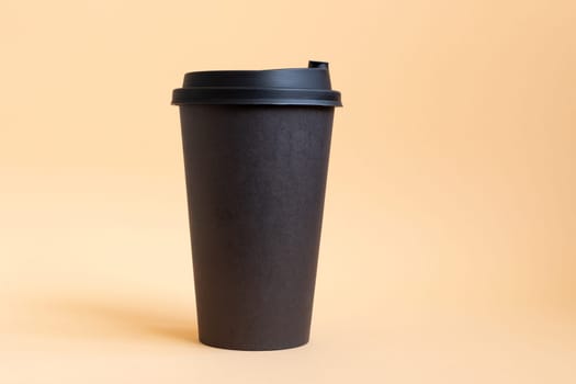 Set of three takeaway black coffe cup on neutral background. Mock -up, nobody, front view