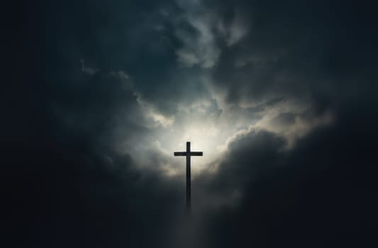 Cross in the clouds radiates the light of faith and hope. Sign of faith.