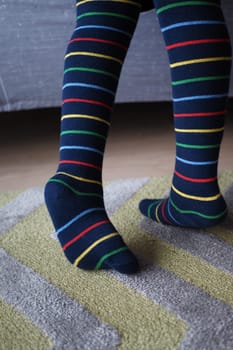 child with long soft socks .