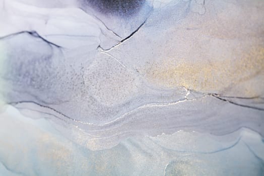 Abstract art with blue and gold background, beautiful smudges and stains made with alcohol ink. Abstract painting, background for wallpapers, posters, cards, invitations, websites.