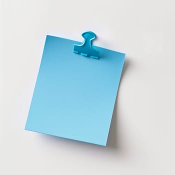Cyan post-it on a white background.