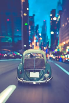 Retro Vintage Car With Suitcase Luggage On Back In New York City At NIght