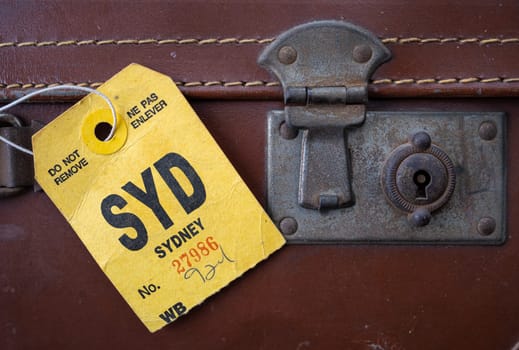 A Retro Luggage Tag On A Vintage Suitcase, For Sydney, Australia