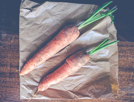 Rustic Image Of Organic Carrots On A Paper Bag From A Farmer's Market