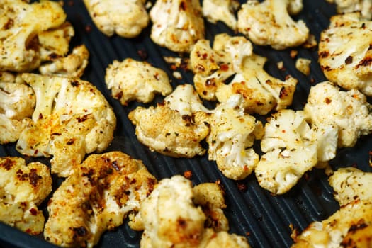 Crispy Cauliflower Sizzle: A Grilled Vegetarian Delight. Close up