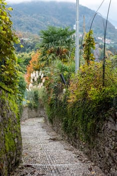 Enchanted alleyway in the scenic town of Bellagio at lake Como, Italy