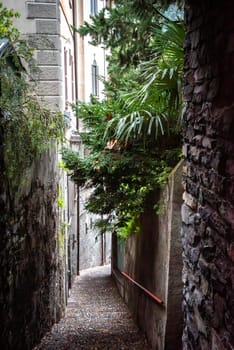 A romantic narrow alley in Varenna at lake Como, Italy