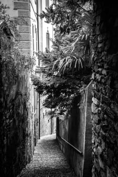 A romantic narrow alley in Varenna at lake Como, Italy