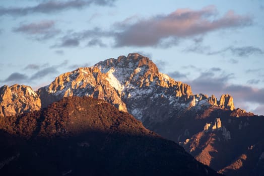 Sunset at snowcapped mount Grigna at lake Como, Italy