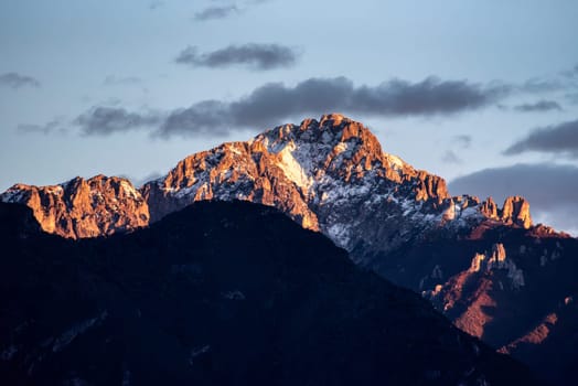 Sunset at snowcapped mount Grigna at lake Como, Italy