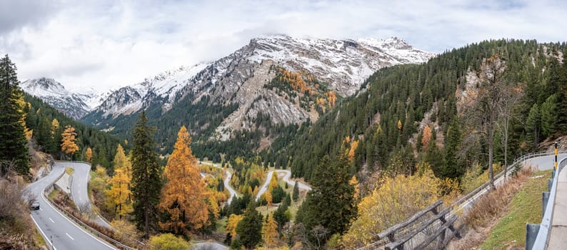 Scenic winding road at Maloja pass in Switzerland in autumn