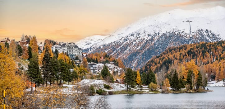 St. Moritz and lake in autumn, surrounded by snowcapped mountains, Switzerland