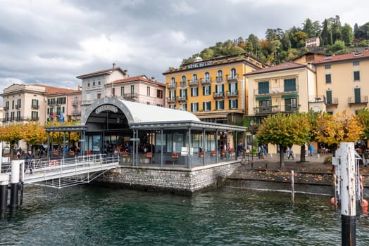 BELLAGIO, ITALY - OCTOBER 02,2023 - Ship jetty in the town center of Bellagio, Italy