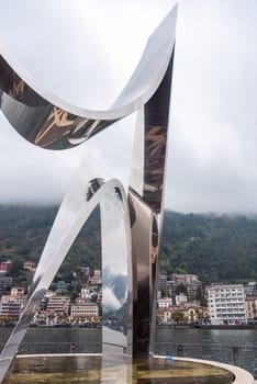 COMO, ITALY - OCTOBER 05, 2023 - Modern sculpture Life Electric at lake Como, Italy