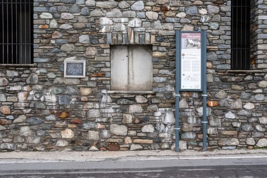 MUSSO, ITALY - OCTOBER 05, 2023 - Information boards at the street in Musso, where dictator Mussolini became captured at the end of World War II, Italy