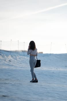 Grandvalira, Andorra: 2024 January 31: Woman taking photos at the Grandvalira ski resort in 2023.