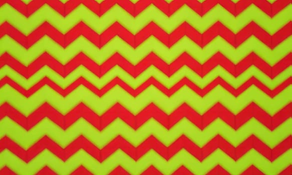 A gradient wallpaper with Chevron shapes using red and lime gradient colors. Generative AI.