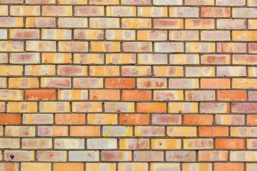 wall made of old yellow bricks as a background 1